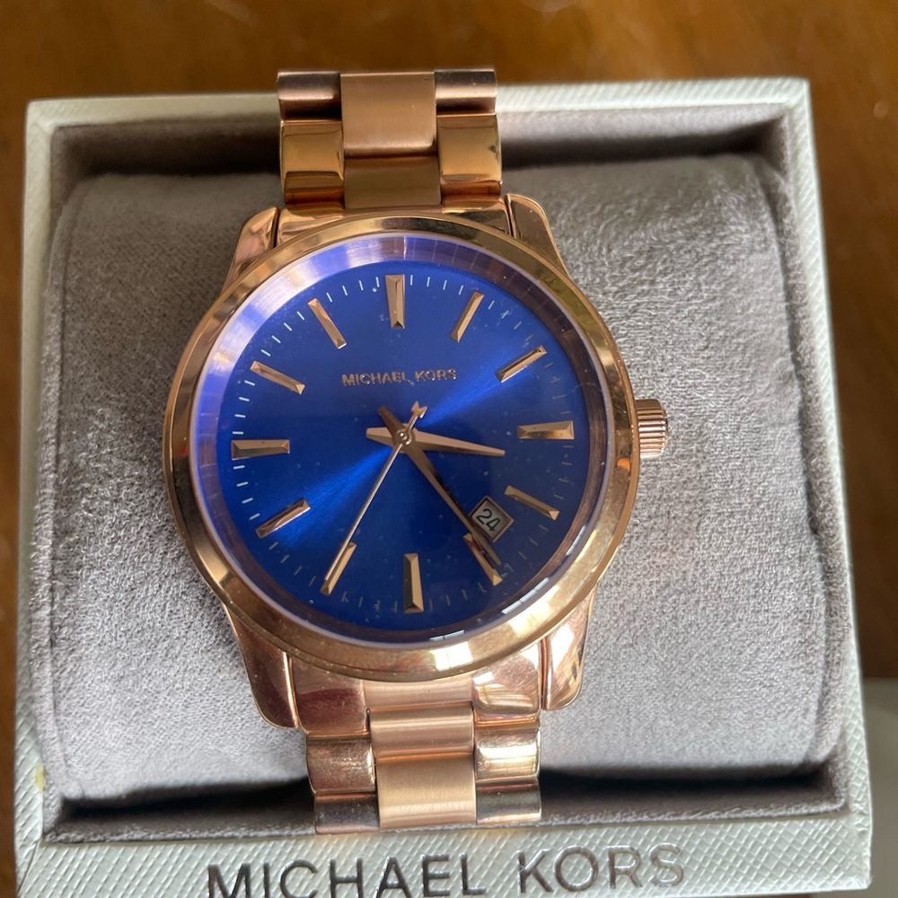 Michael Kohrs blue face with rose gold band